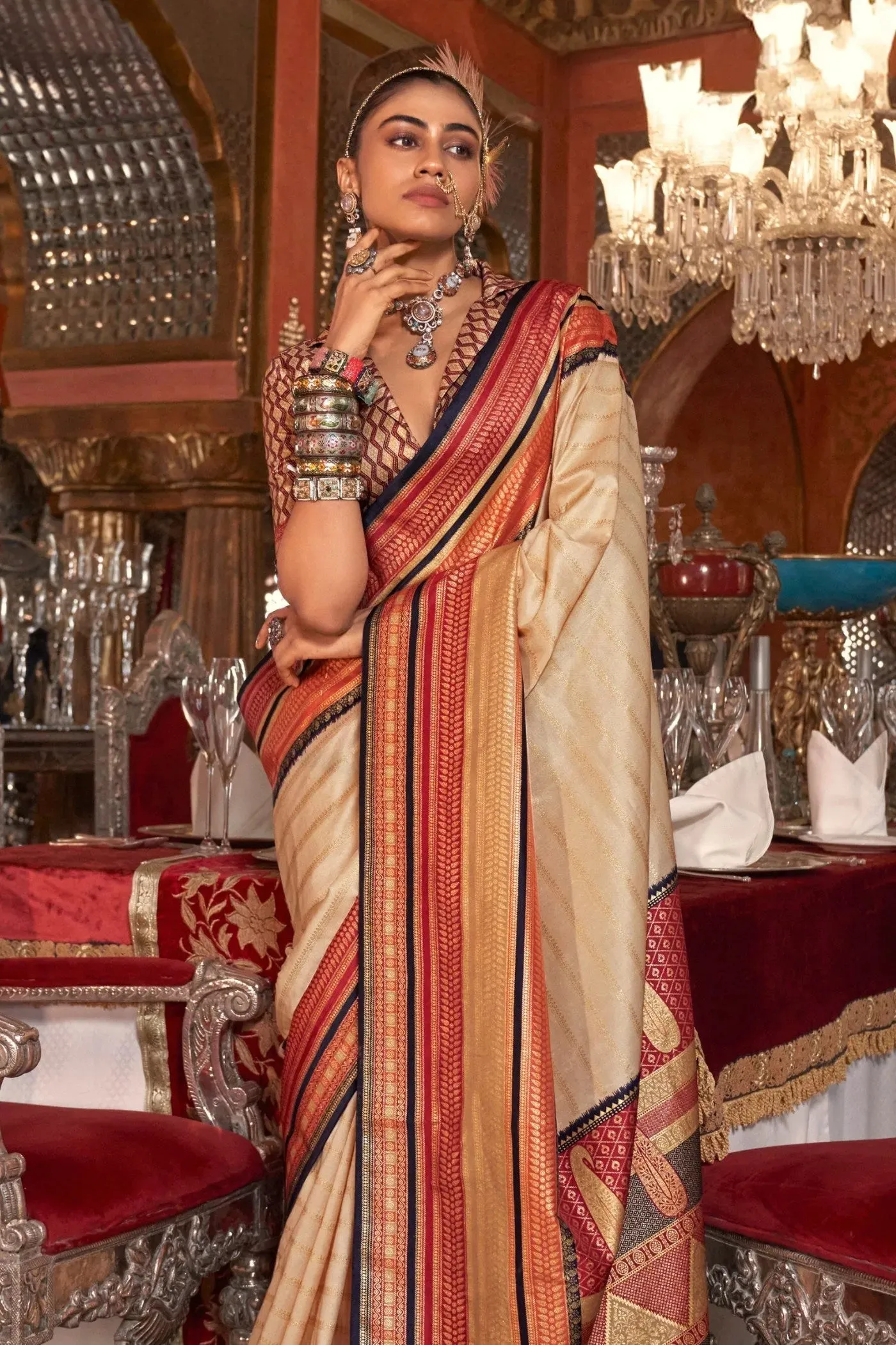 Charming Cream Kanjivaram and Patola Printed Silk Saree