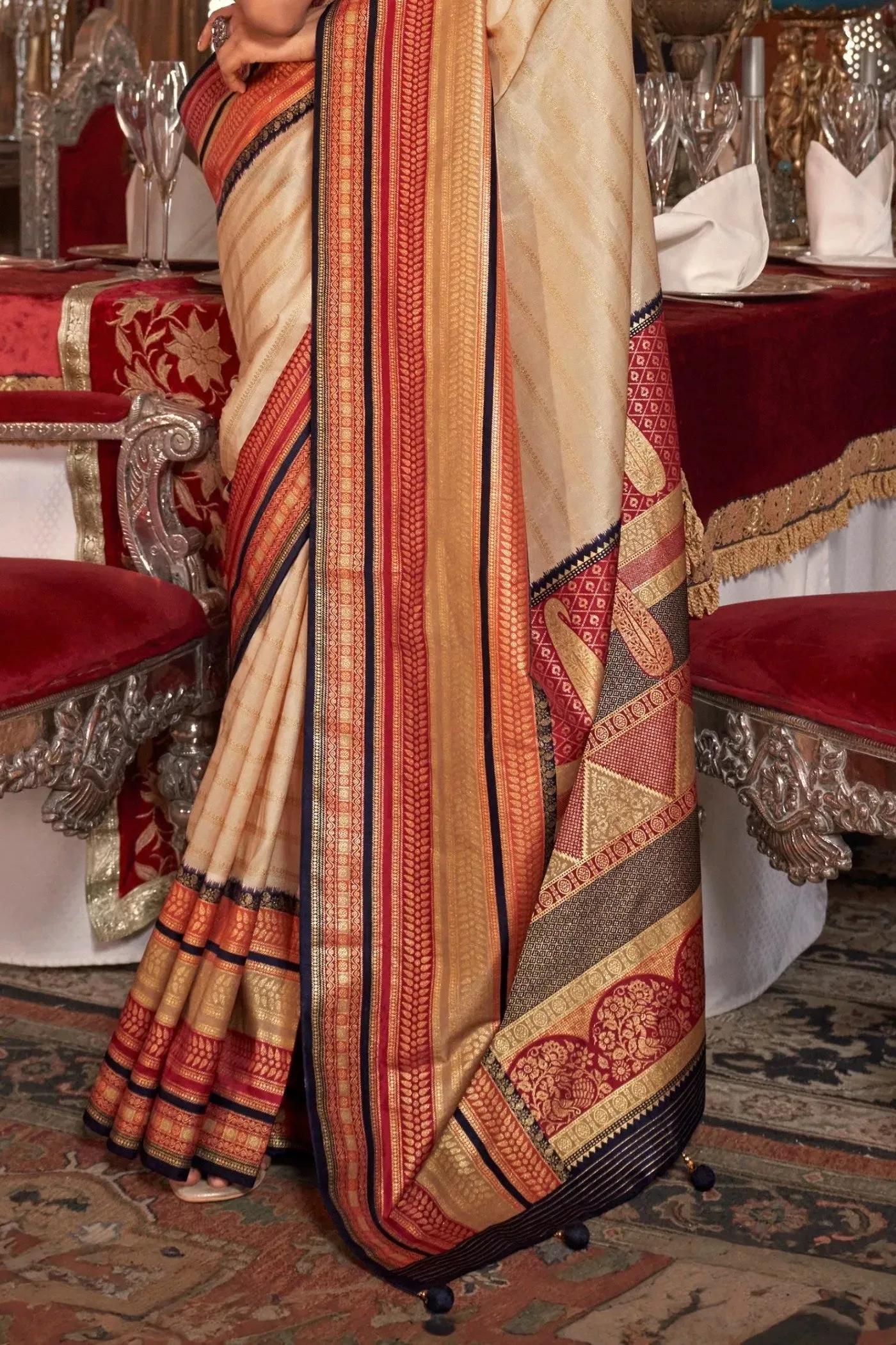 Charming Cream Kanjivaram and Patola Printed Silk Saree