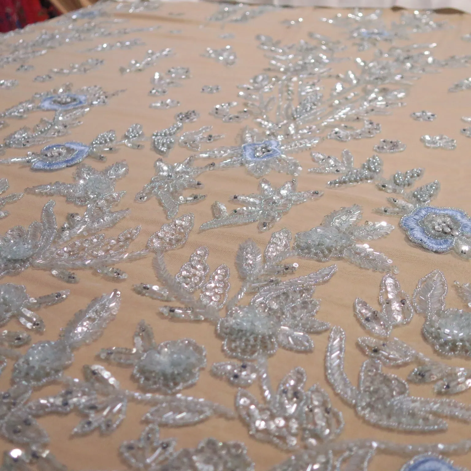 Clear Background with Sky Blue Accents Floral Embroidered Tulle Fabric