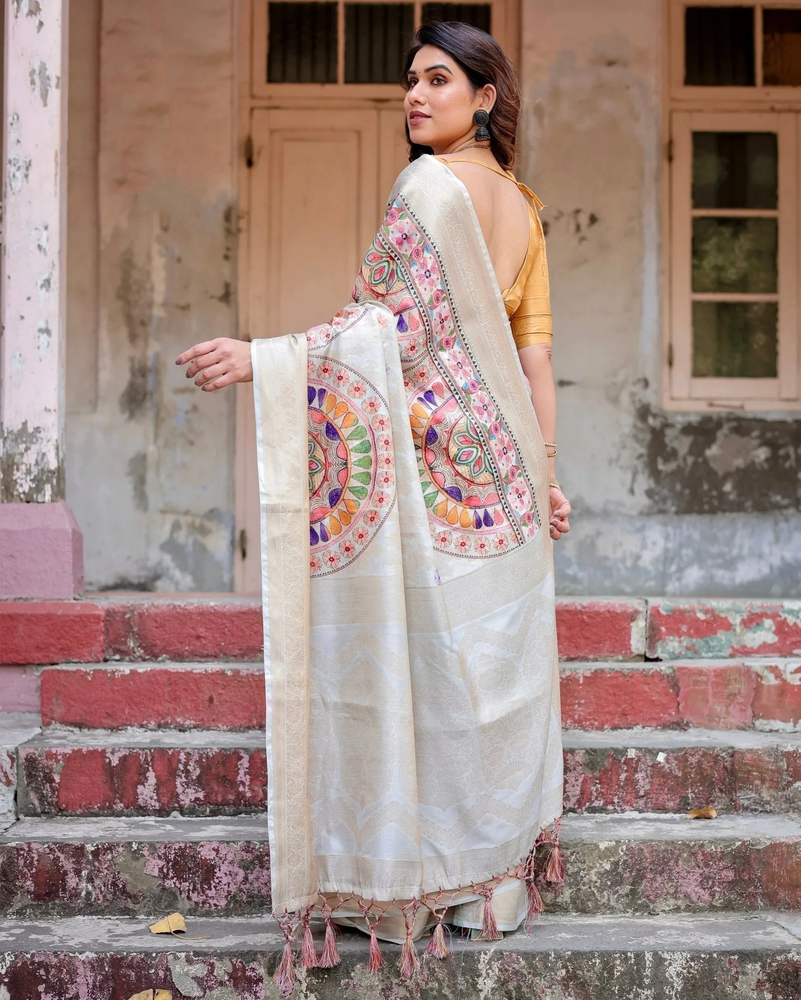 Off-White and Multicolor Mandala Design Banarasi Silk Saree with Zari Weave and Tassel-Adorned Pallu