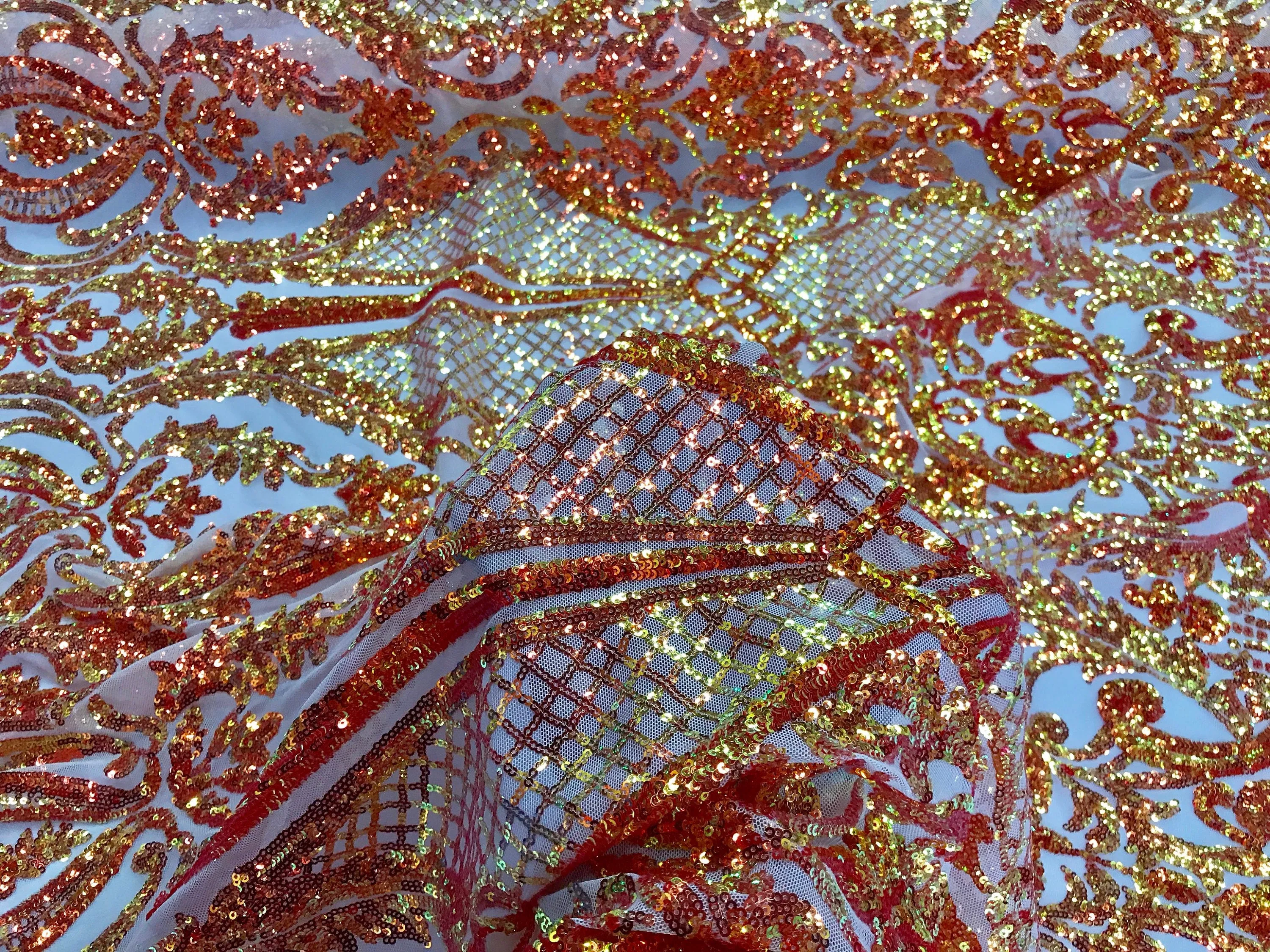 Orange princess design iridescent sequins embroidery on a 4 way stretch nude mesh-dresses-fashion-apparel-nightgown-prom-sold by the yard.